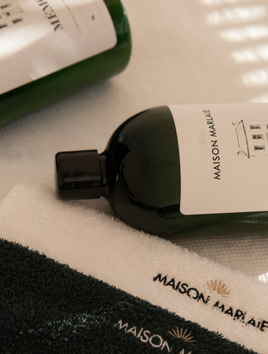 Maison Marlaie PURE detergent and MÉMOIRE softener on towels